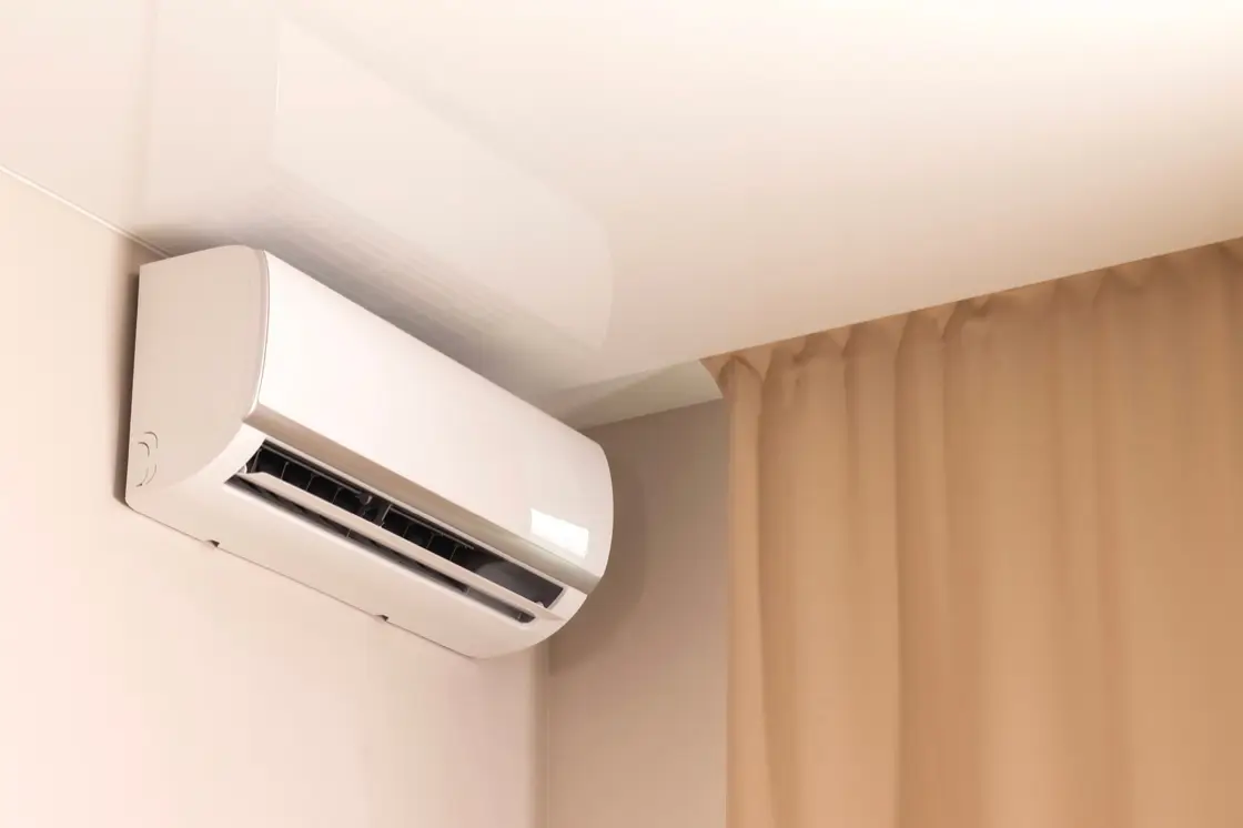 White air conditioner mounted in a modern Naperville room